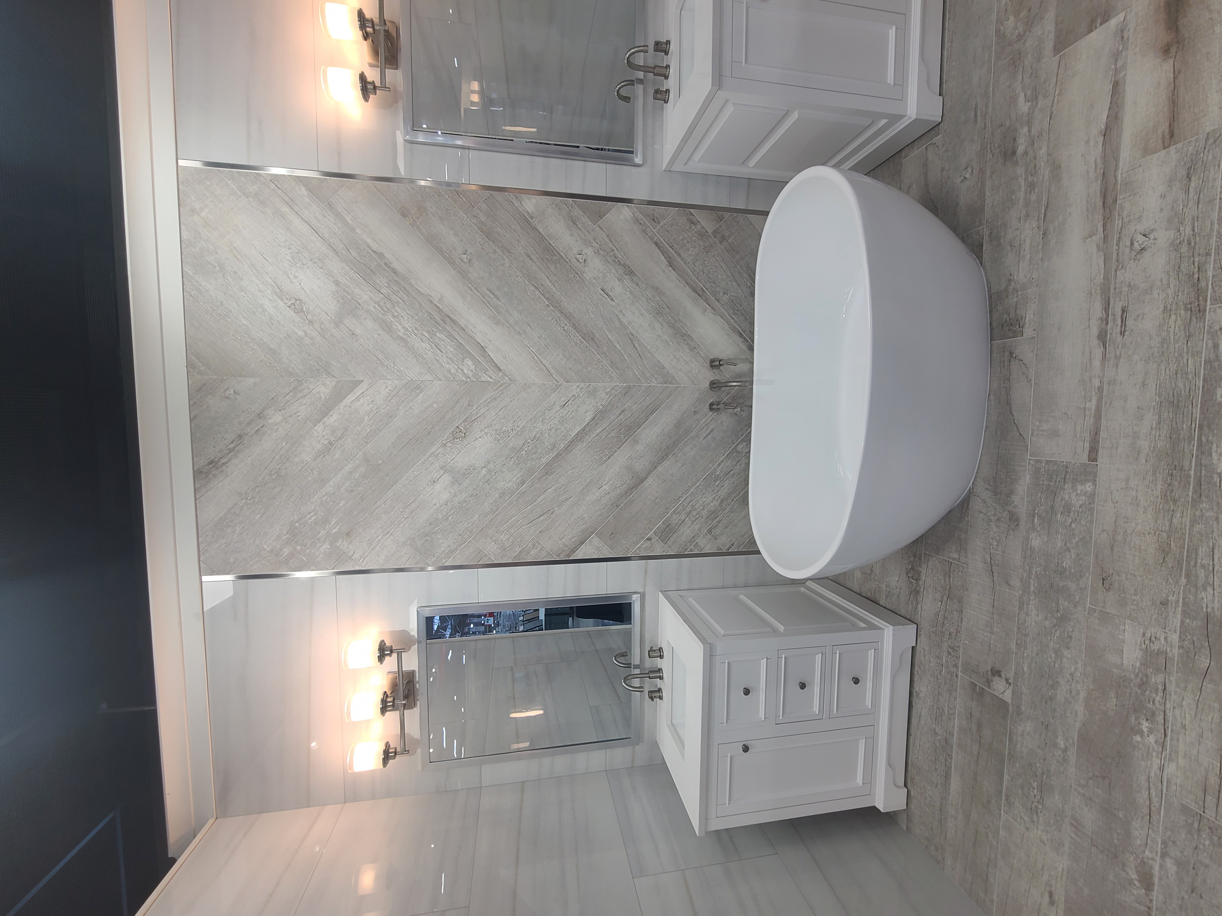 Custom tile and stone bathroom remodel with elegant finishes in Tulsa, OK