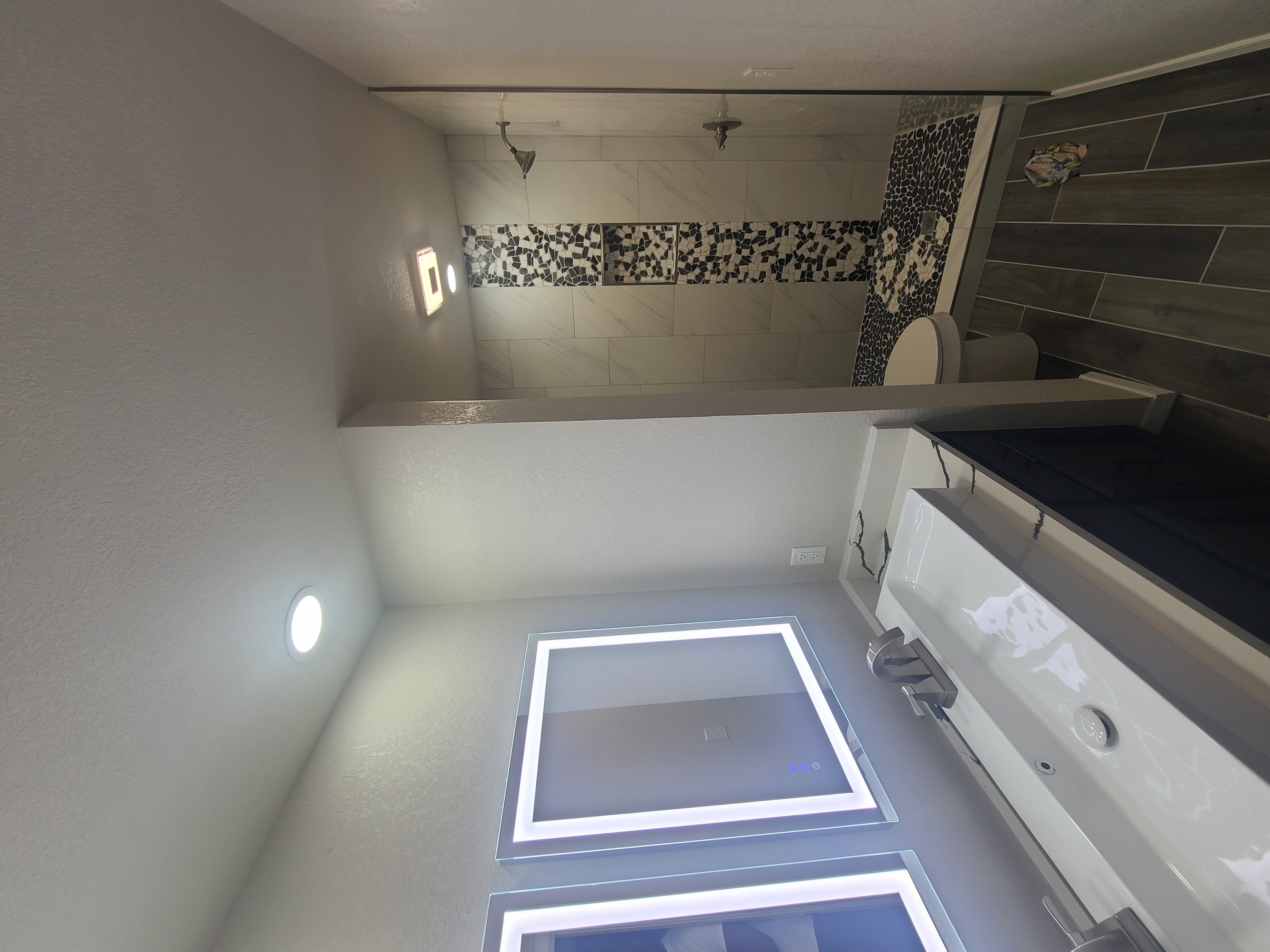 Luxury bathroom remodel featuring premium materials and statement design