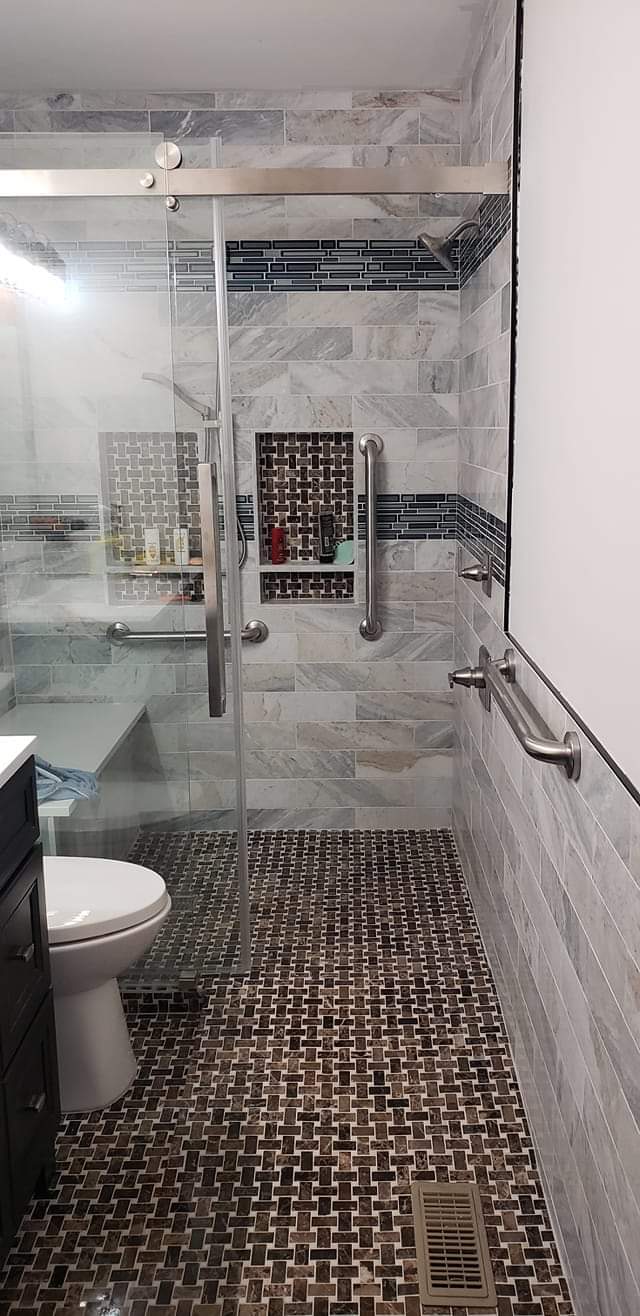 Custom walk-in shower with frameless glass enclosure in Tulsa, OK